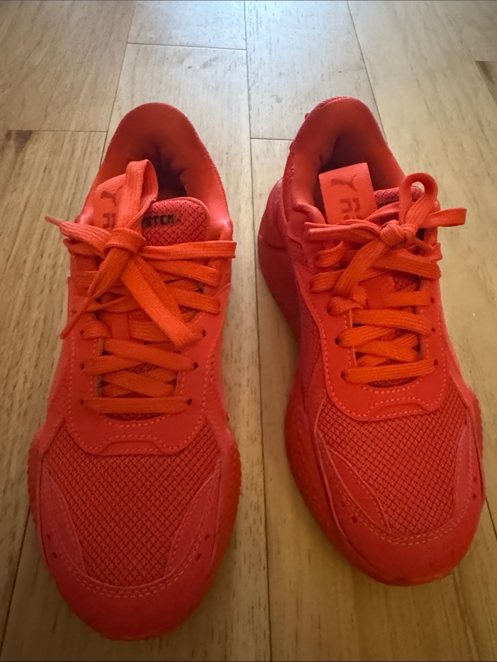 Puma women’s Bright Red Lace-Up Sneakers